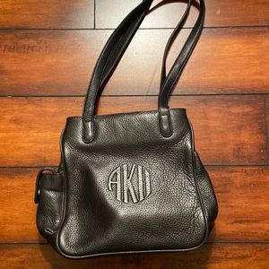 Great black leather purse w/double straps, three zipper compartments! Like new!